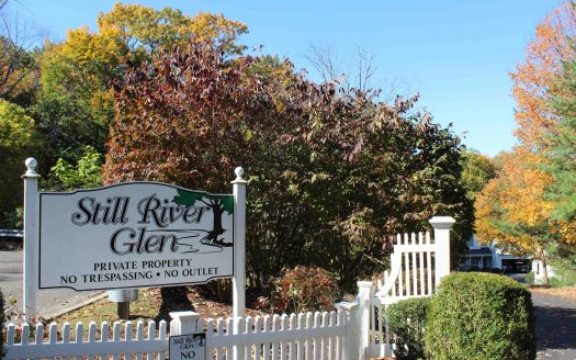 Front entrance sign of Still River Glen